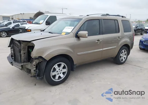 2011 Honda Pilot Touring z USA, uszkodzony, nr VIN 5FNYF3H97BB056172